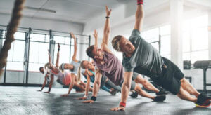 image: group class of people exercising